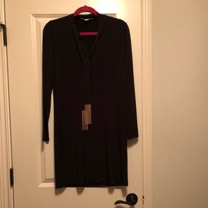 Black dress with gold details tassels.